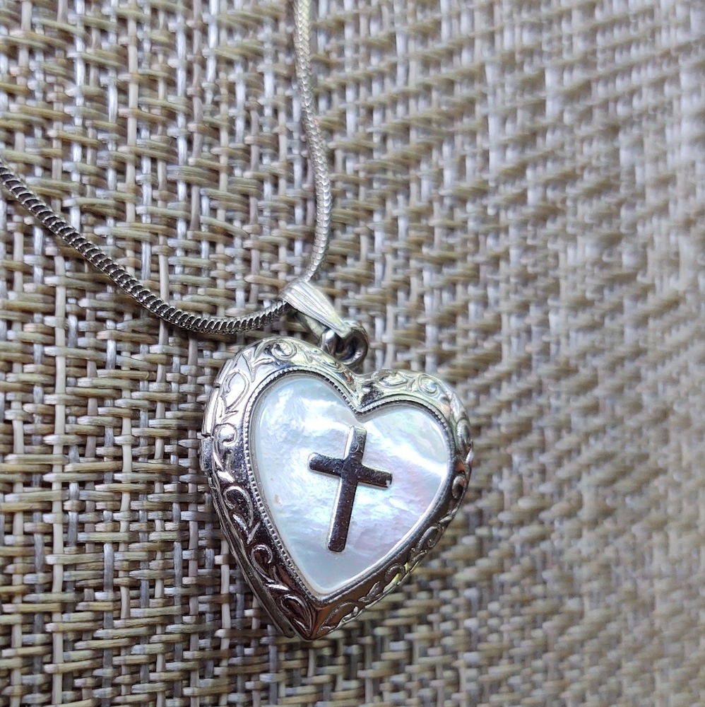 Sterling silver mother of pearl cross locket